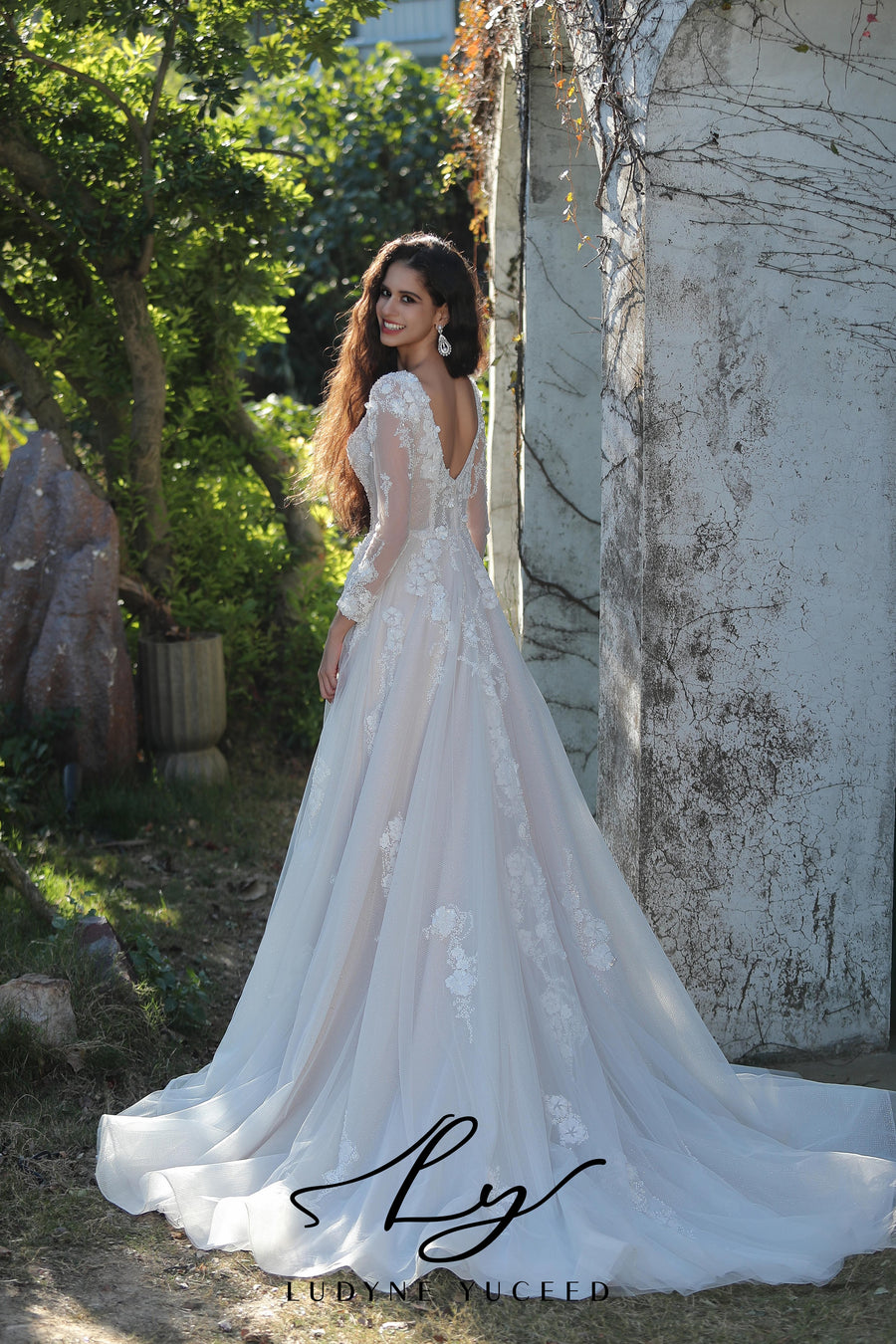 Ethereal Long-Sleeved A-Line Wedding Gown With Intricate Floral Embroidery