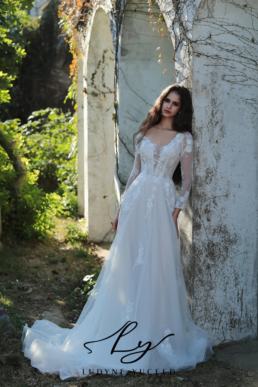 Ethereal Long-Sleeved A-Line Wedding Gown With Intricate Floral Embroidery