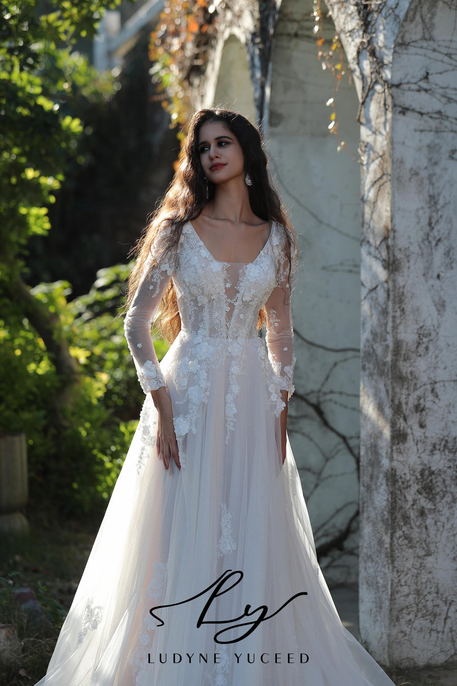 Ethereal Long-Sleeved A-Line Wedding Gown With Intricate Floral Embroidery